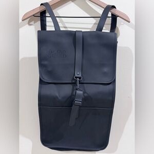 Rains Sleek Black Backpack for Men